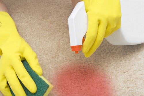 Professional upholstery cleaning in Holloway for a fabric sofa